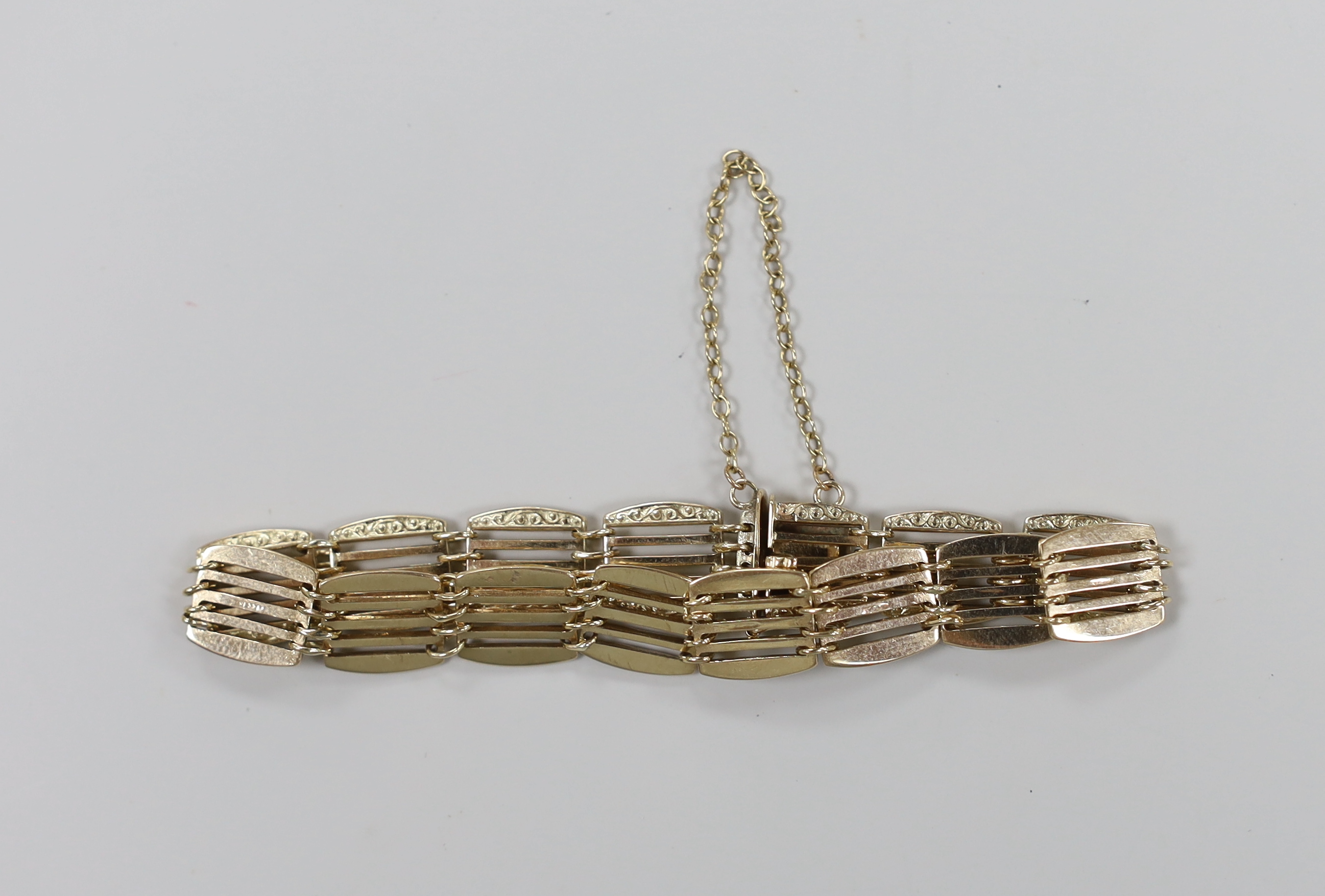 A modern 9ct gold fancy gate link bracelet, 17cm, 13.9 grams.